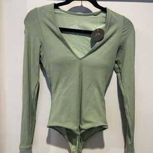Klassy Network Jade deep V Long Sleeve Bodysuit. Small.